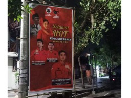 Sambut HUT ke-730 Surabaya, Pengacara Muda ini Sebar Puluhan Baliho
