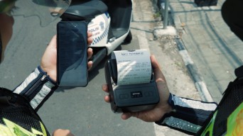 Polisi di Kota Malang Terapkan Tilang E-TLE Mobile Handheld, Apa Itu?