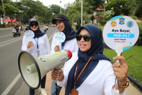 Cara Unik Sosialisasi Pembayaran PBB di Surabaya