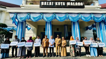 Pedagang hingga Driver Ojol Malang Terima Santunan BPJS Ketenagakerjaan