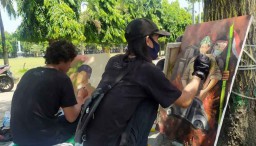 Ingatkan Warga Jaga Prokes, Para Seniman Lukis Pahlawan Bermasker