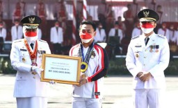 Pilihan Pembaca: Ular Piton Ditemukan di Mobil hingga Upacara Kemerdekaan RI