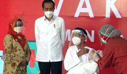 Jokowi Minta Vaksinasi Nasional Diselesaikan Tahun ini