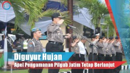 Video: Diguyur Hujan, Apel Pengamanan Pilgub Jatim tetap berlanjut
