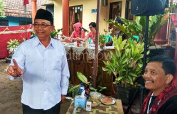 Bersama Keluarga, Bupati Blitar Nyoblos Pilgub Jatim di TPS 10