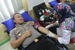 Menjelang May Day, Polisi Gelar Pengobatan Gratis Bagi Buruh