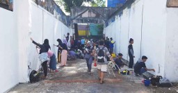 Puluhan Seniman Kota Malang Gelar Aksi Melukis di Dinding